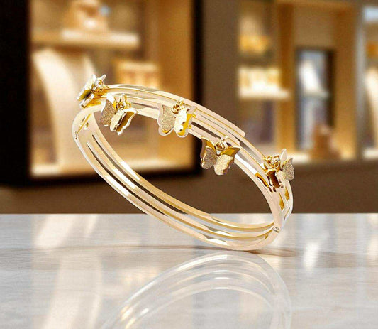 Bracelet jonc papillons dorés – Acier inoxydable 316L – Féminité et légèreté